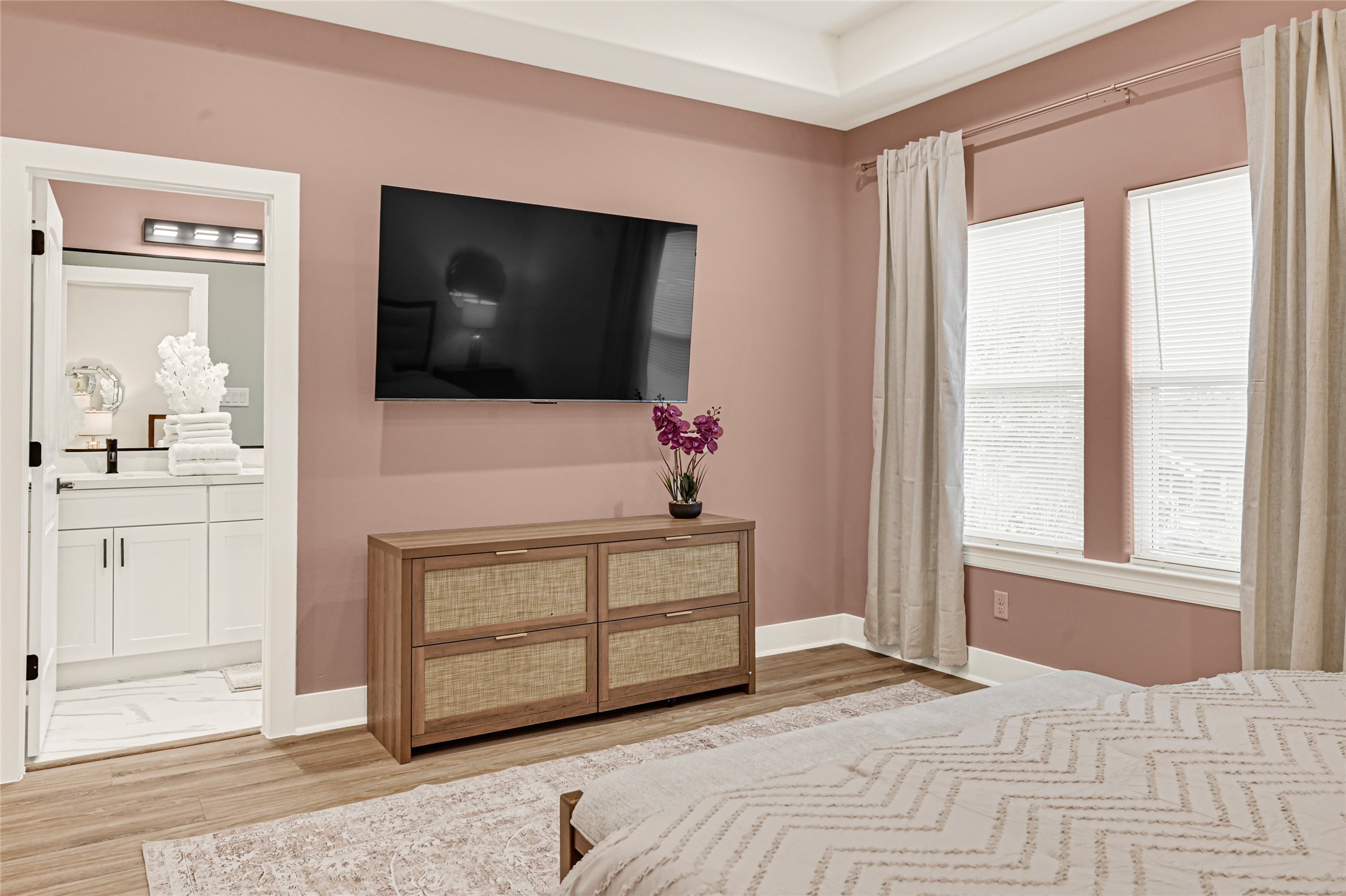 3834 Mt Pleasant Street Houston, TX 77021 - Photo 22 of 33 a bedroom with a bed and a flat screen tv