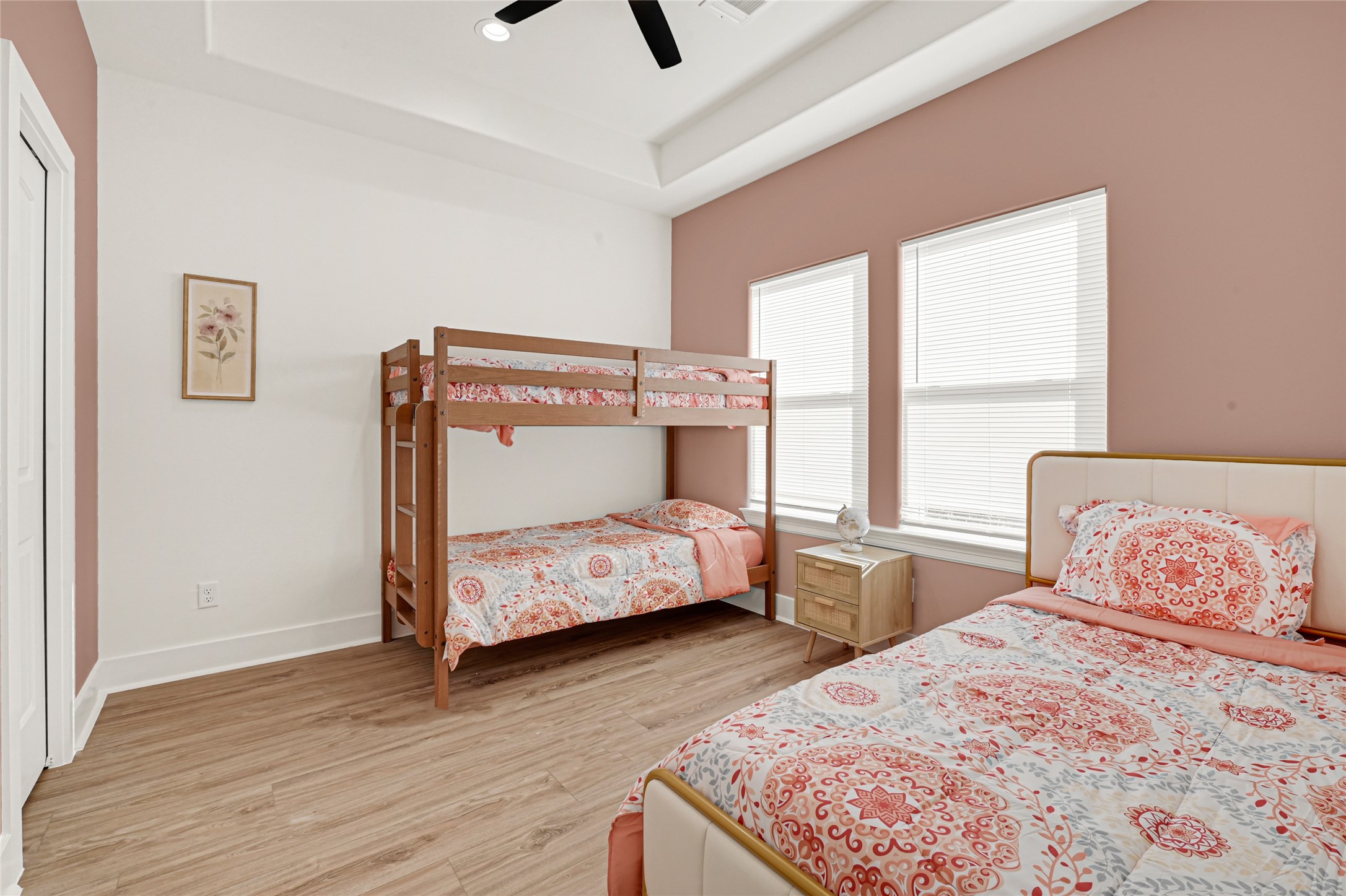 3834 Mt Pleasant Street Houston, TX 77021 - Photo 28 of 33 a bedroom with a bed and wooden floor