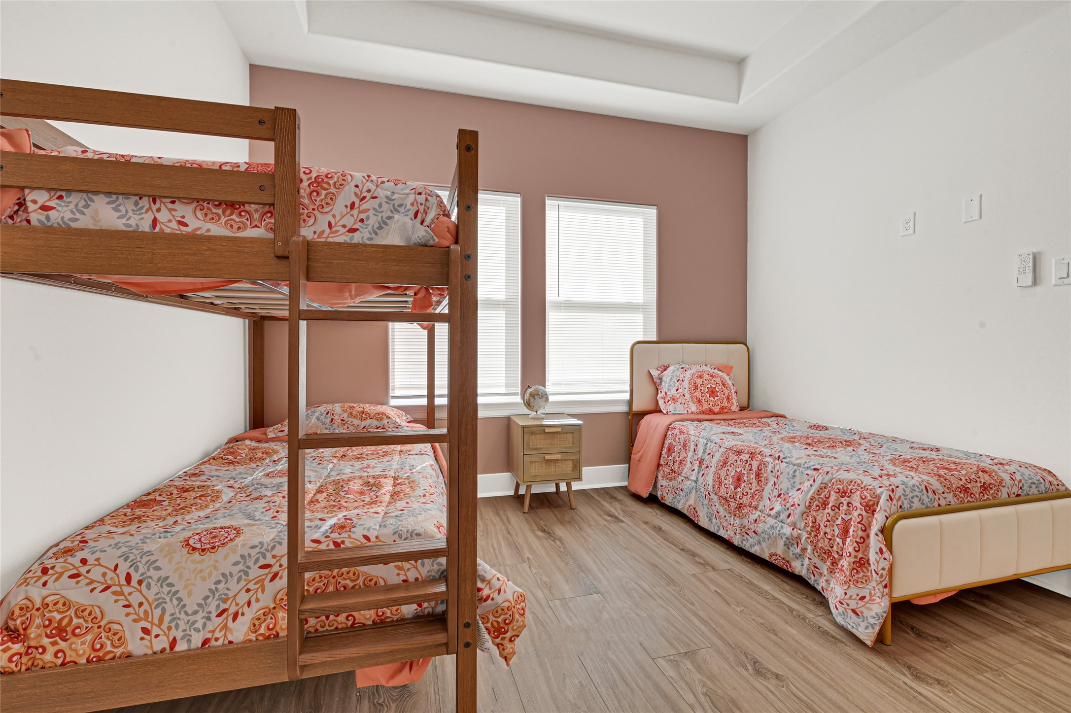 3834 Mt Pleasant Street Houston, TX 77021 - Photo 29 of 33 a bedroom with a bed and wooden floor