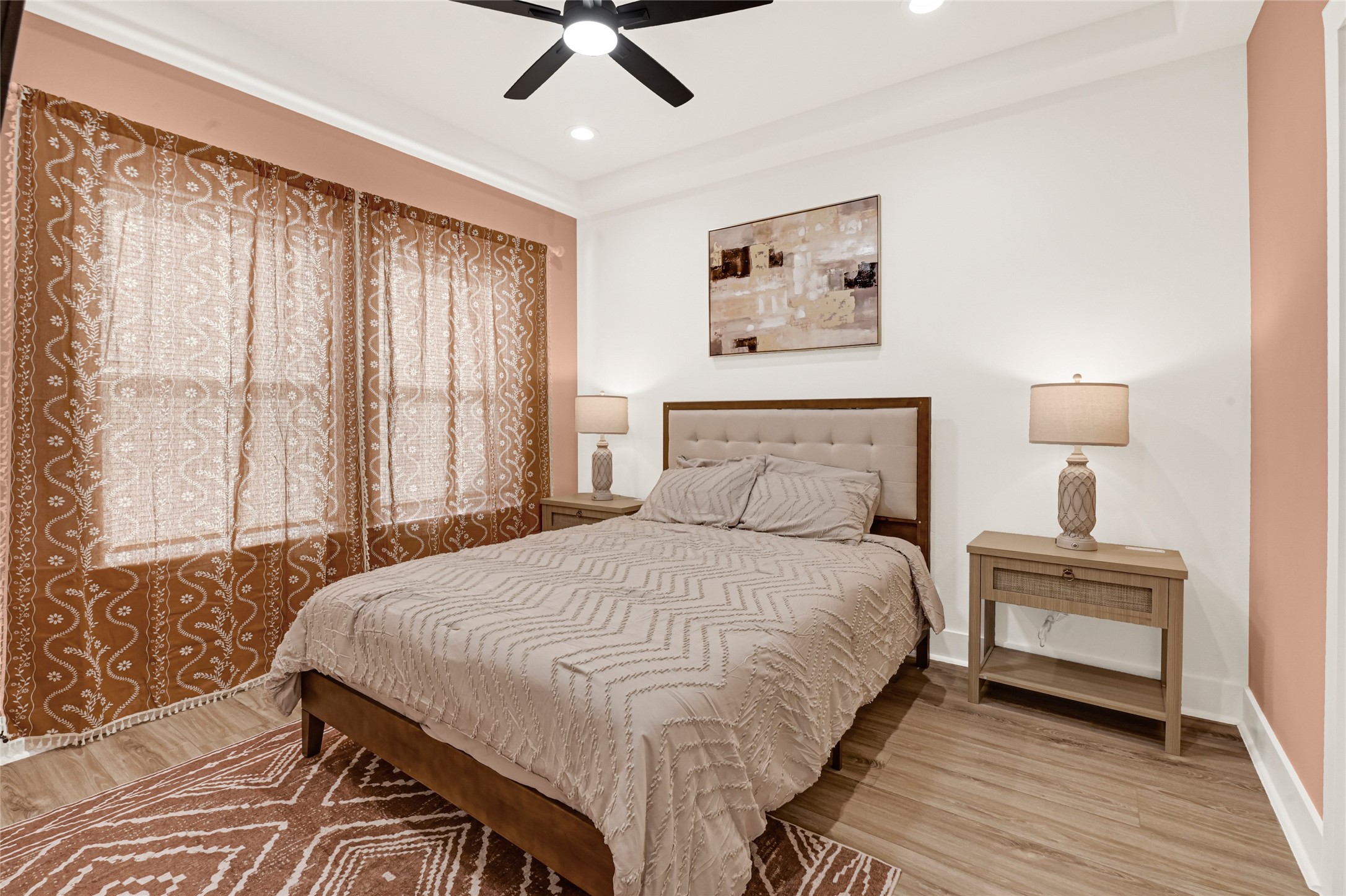 3834 Mt Pleasant Street Houston, TX 77021 - Photo 10 of 33 a bedroom with a bed and a night stand