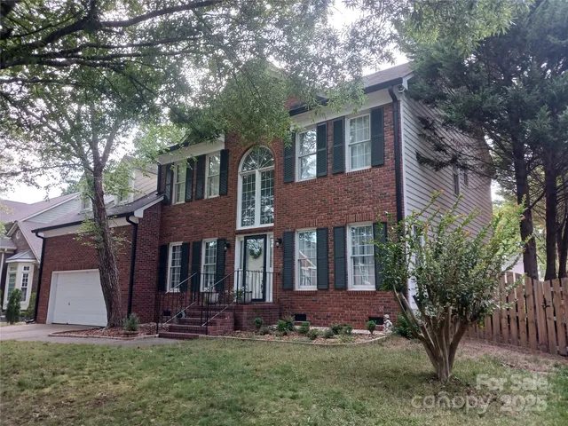 front view of house with a yard