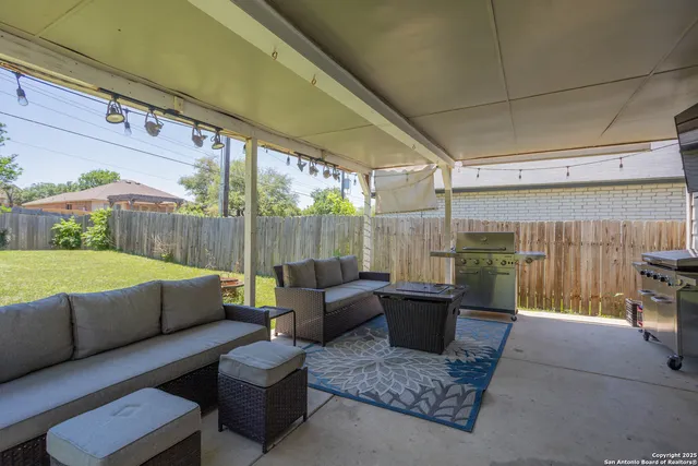 a outdoor living space with patio furniture