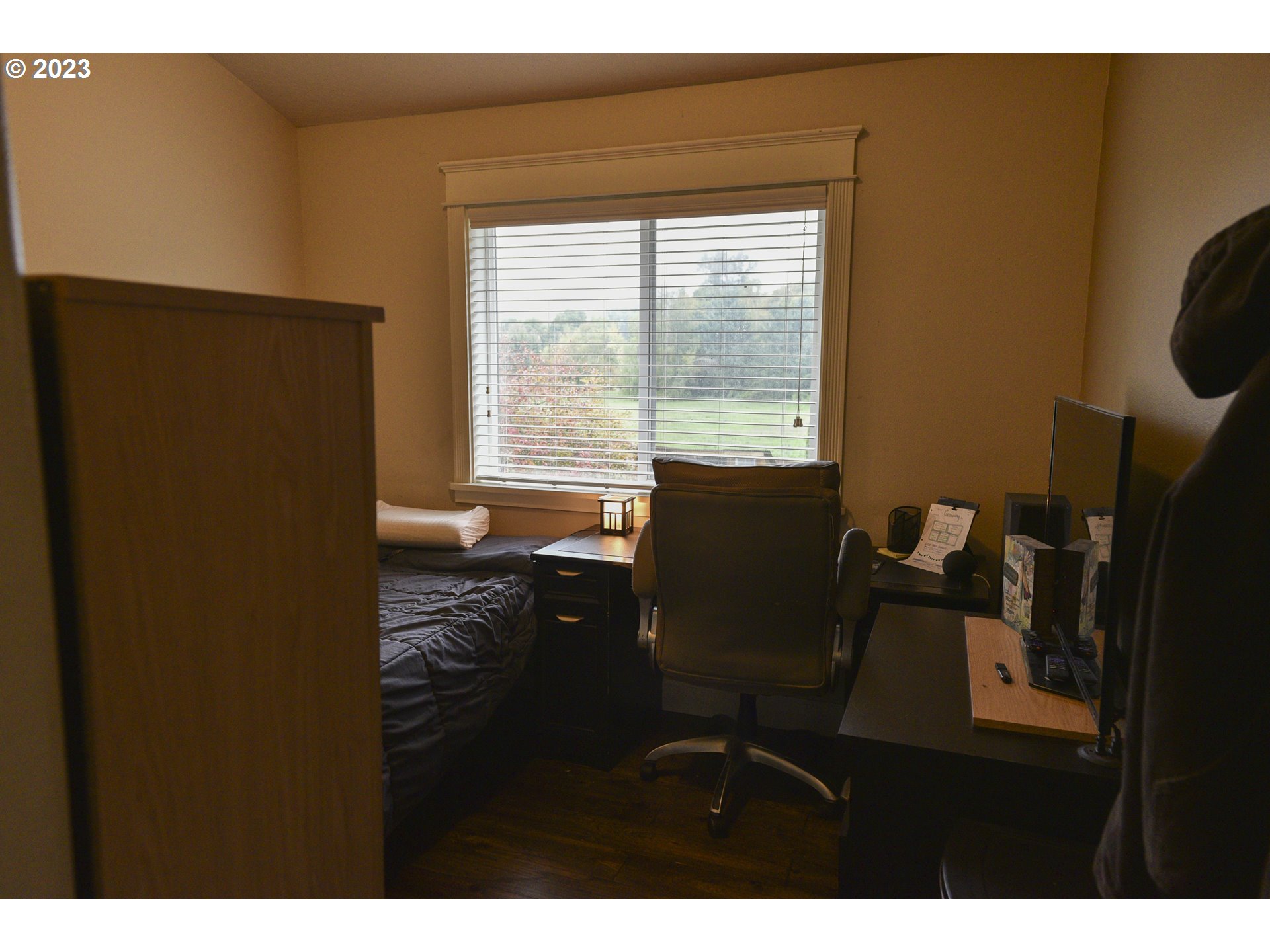 6790 Jacob Lane Springfield, OR 97478 - Photo 16 of 30 a view of workspace room with wooden floor windows