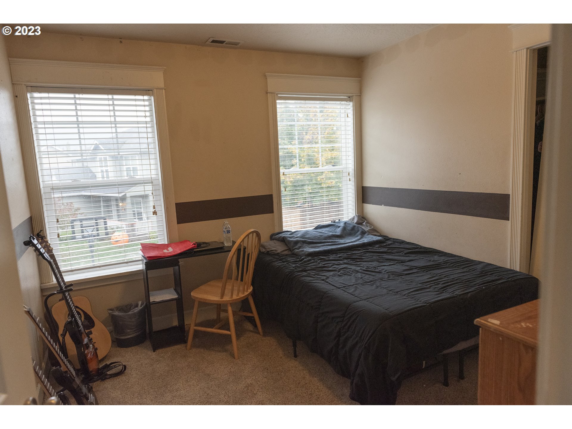 6790 Jacob Lane Springfield, OR 97478 - Photo 17 of 30 a bedroom with a bed and a window
