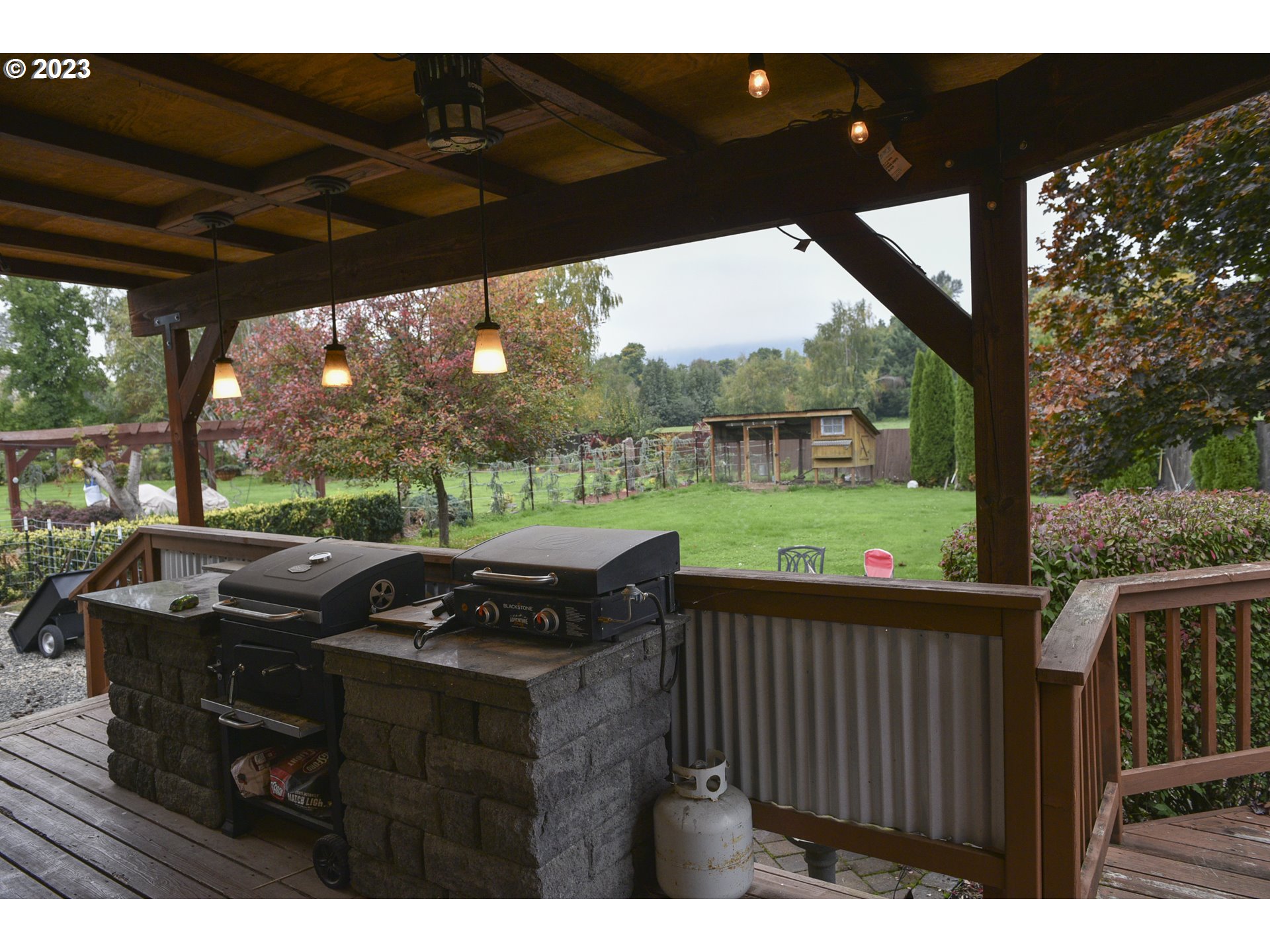 6790 Jacob Lane Springfield, OR 97478 - Photo 26 of 30 a view of yard from deck having patio