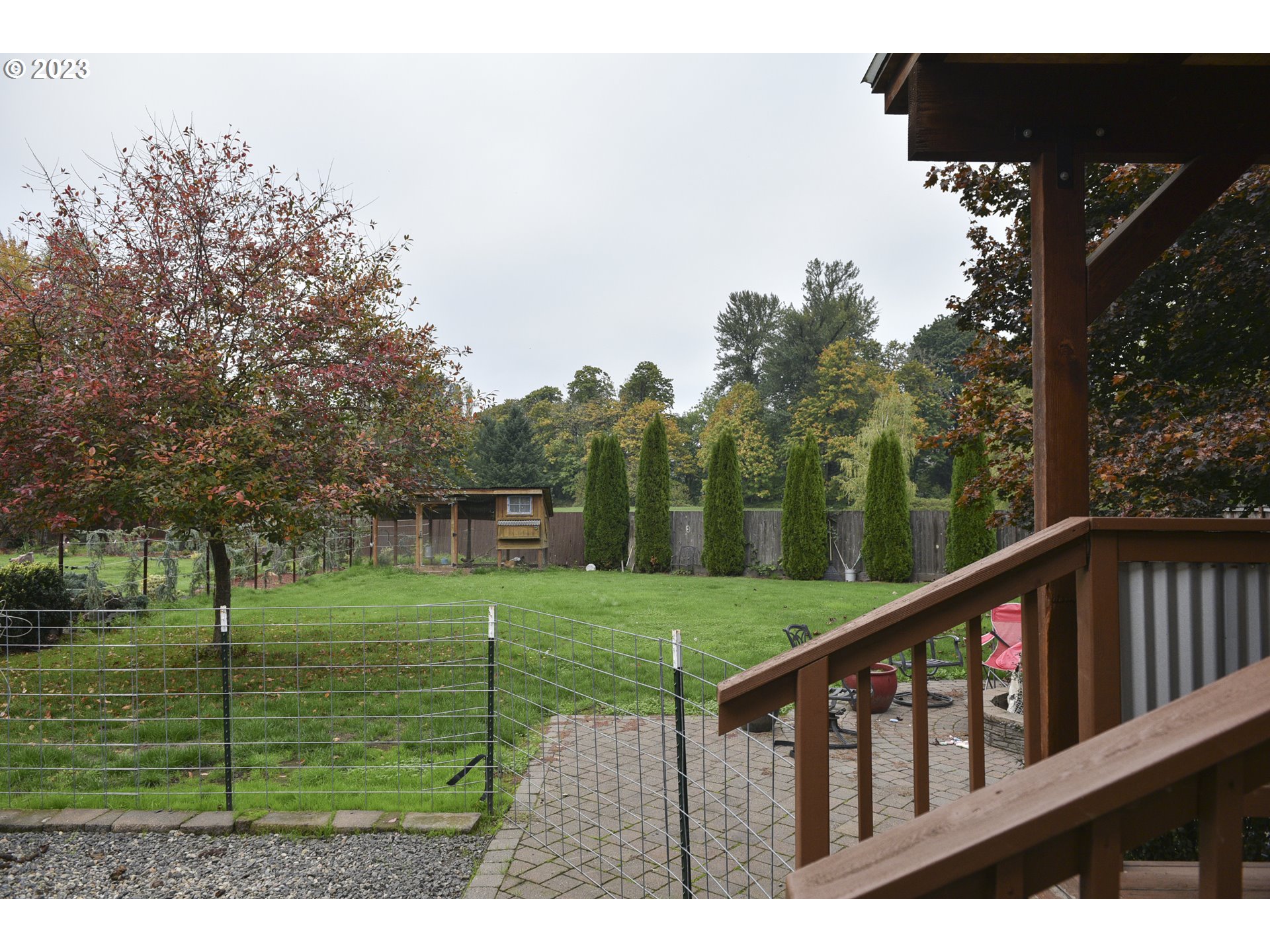 6790 Jacob Lane Springfield, OR 97478 - Photo 28 of 30 a view of a deck with a big yard and large trees