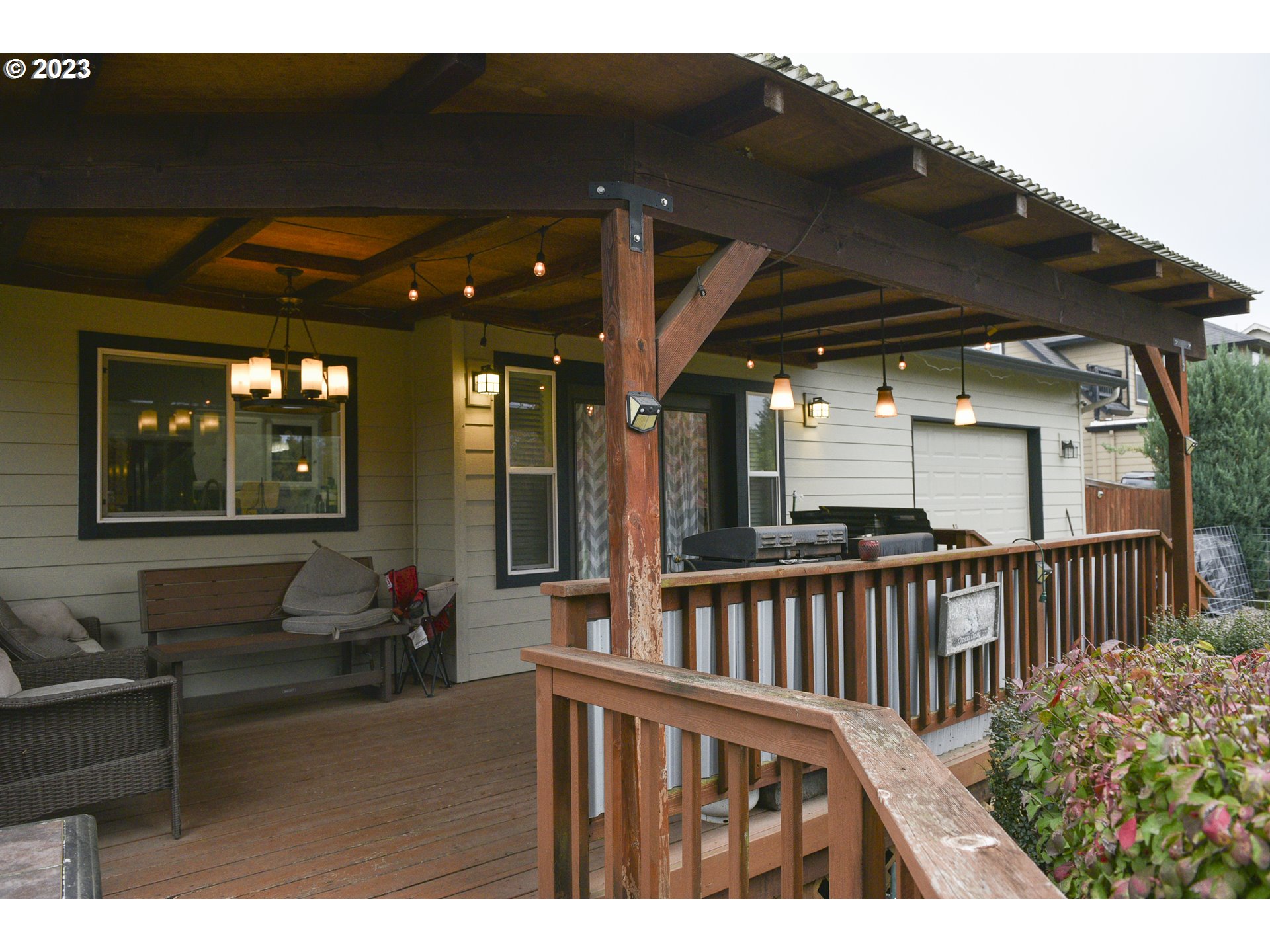 6790 Jacob Lane Springfield, OR 97478 - Photo 30 of 30 a view of a porch with furniture and garden