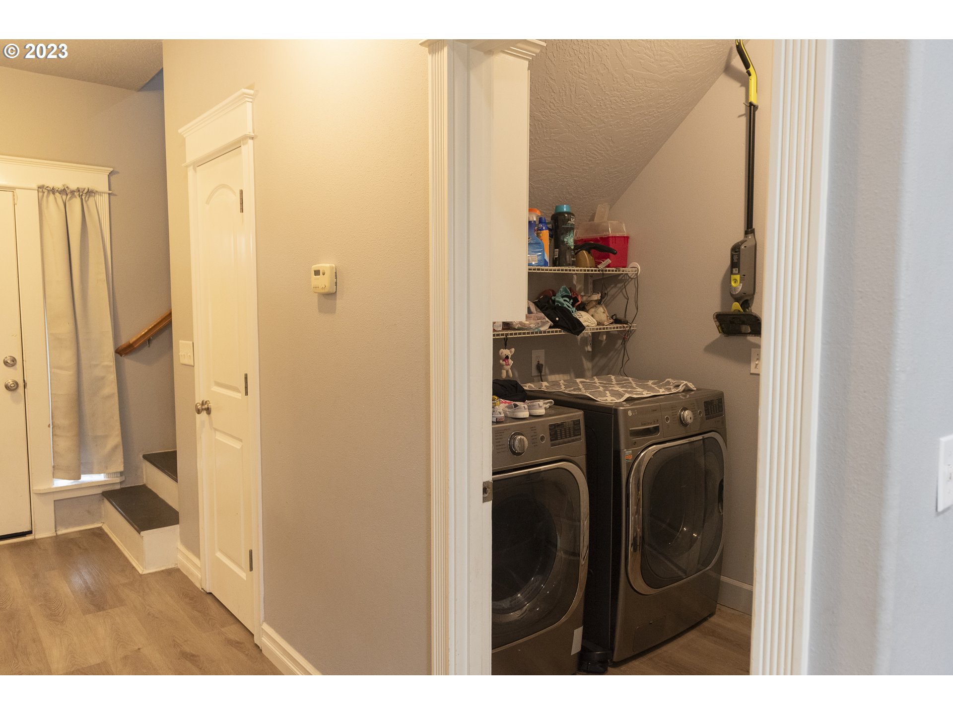 6790 Jacob Lane Springfield, OR 97478 - Photo 3 of 30 a view of a bedroom with washer and dryer