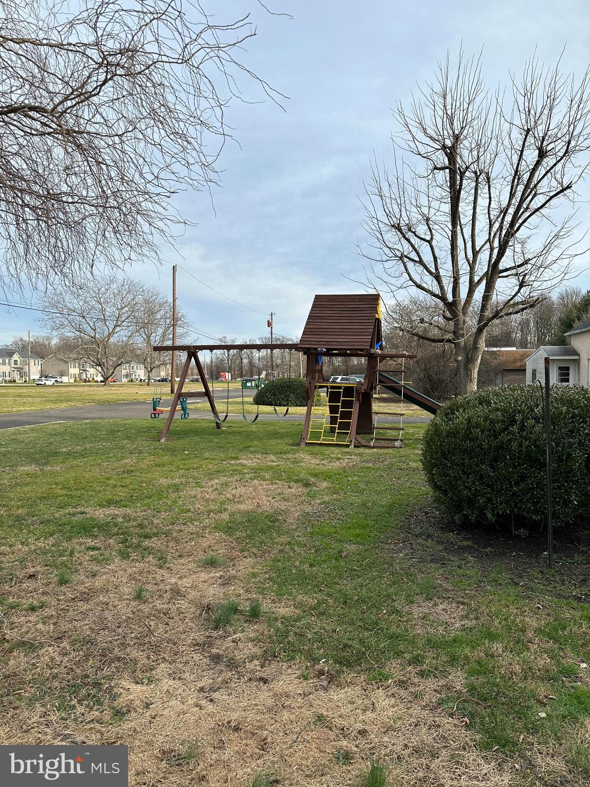 4007 Hulmeville Road Bensalem, PA 19020 - Photo 15 of 16 a view of a garden with a bench