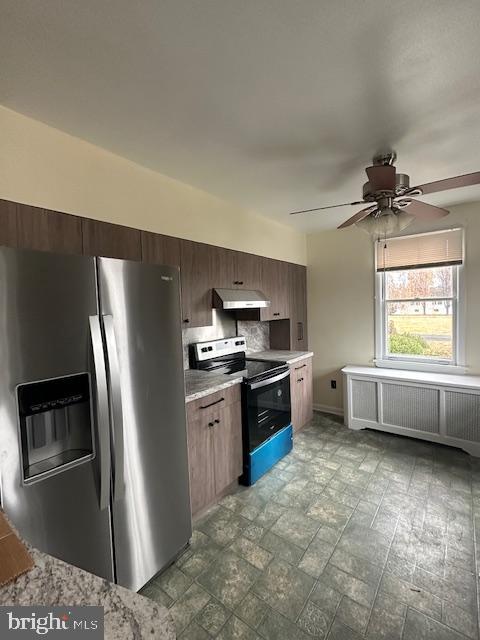4007 Hulmeville Road Bensalem, PA 19020 - Photo 4 of 16 a kitchen with stainless steel appliances granite countertop a refrigerator a sink a stove and a sink