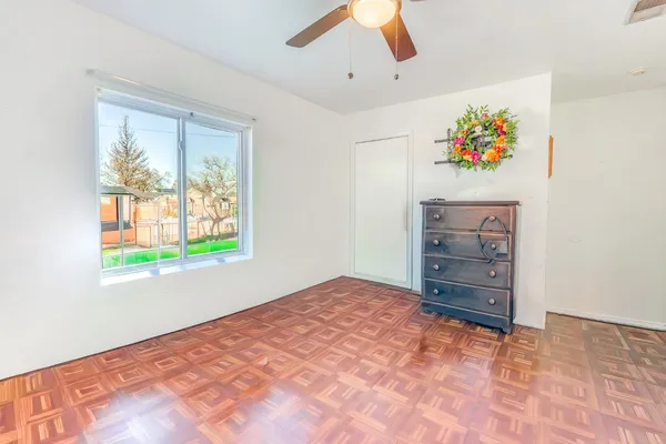a view of room with cabinet and window