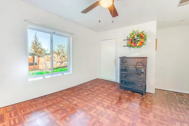 a view of room with cabinet and window