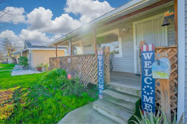 a view of a house with a garden
