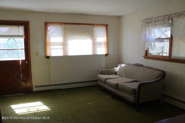 248 Gordons Corner Road Morganville, NJ 07751 - Photo 6 of 13 den.jpg