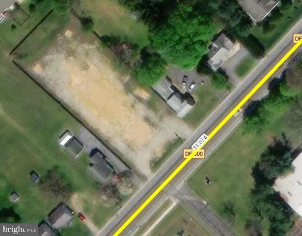 a view of a yard from a balcony