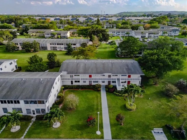 front view of a house with a small yard