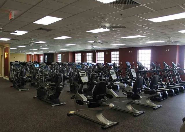 a front view of a house with parking space