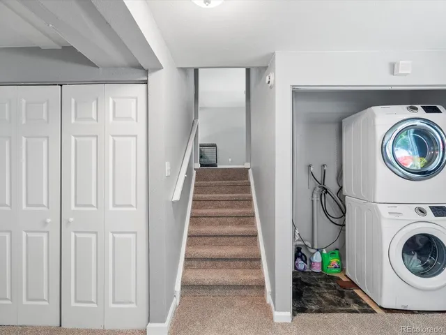 a view of a storage & utility room with washer and dryer
