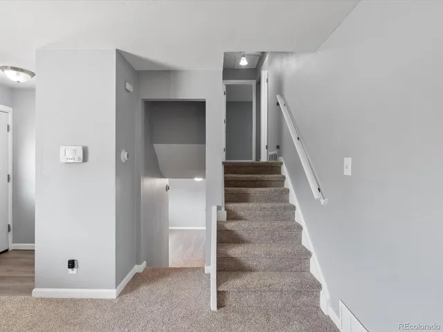 a view of a hallway with entryway