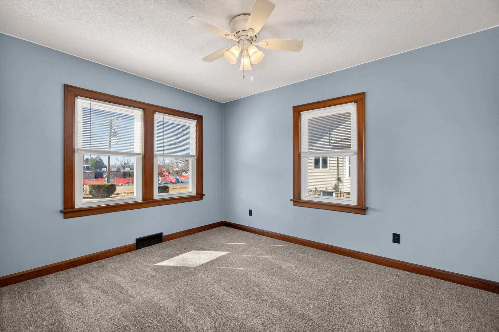 317 West Le Claire Road Eldridge, IA 52748 - Photo 17 of 43 a view of an empty room with a window