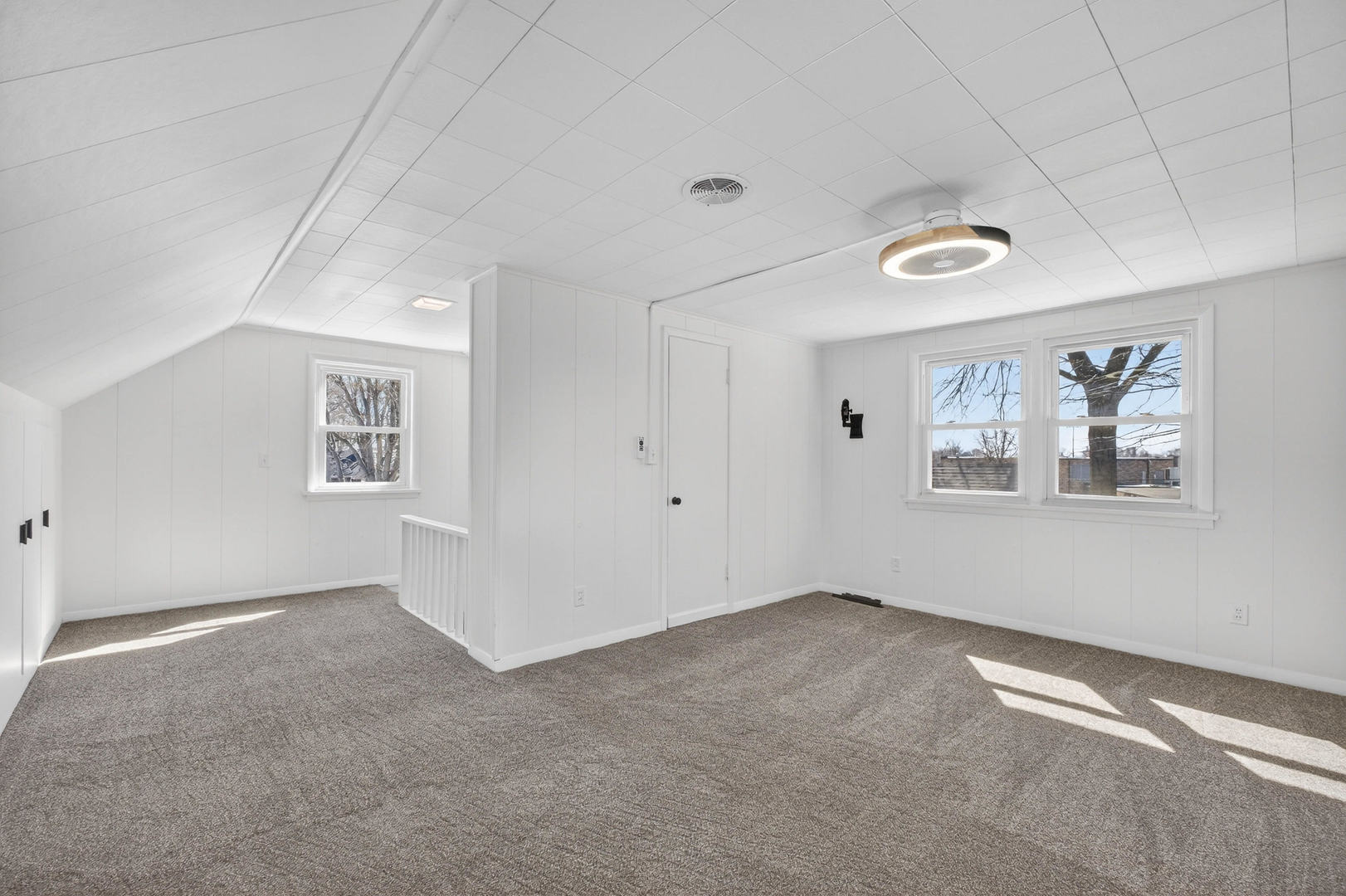 317 West Le Claire Road Eldridge, IA 52748 - Photo 21 of 43 a view of an empty room with a window