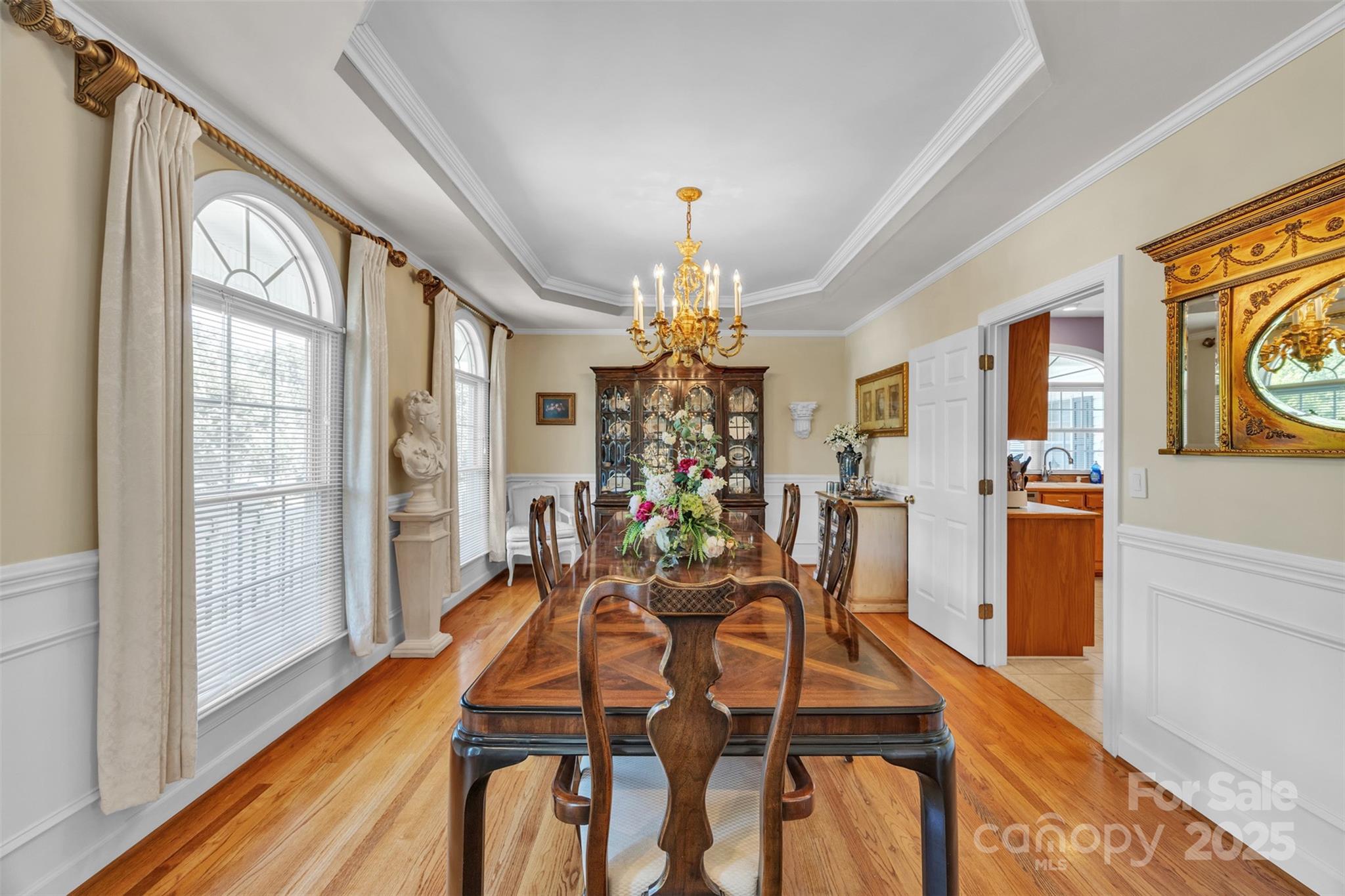 129 Renaissance Place Statesville, NC 28625 - Photo 15 of 43 a view of a dining room with furniture window and wooden floor