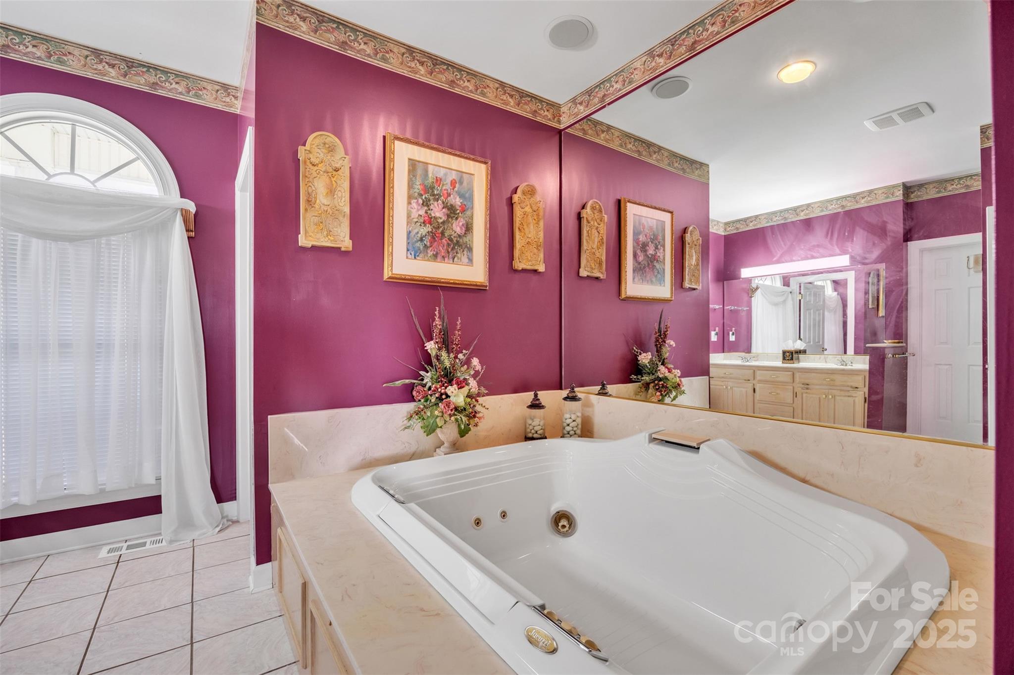 129 Renaissance Place Statesville, NC 28625 - Photo 22 of 43 a bathroom with a tub a sink and a mirror