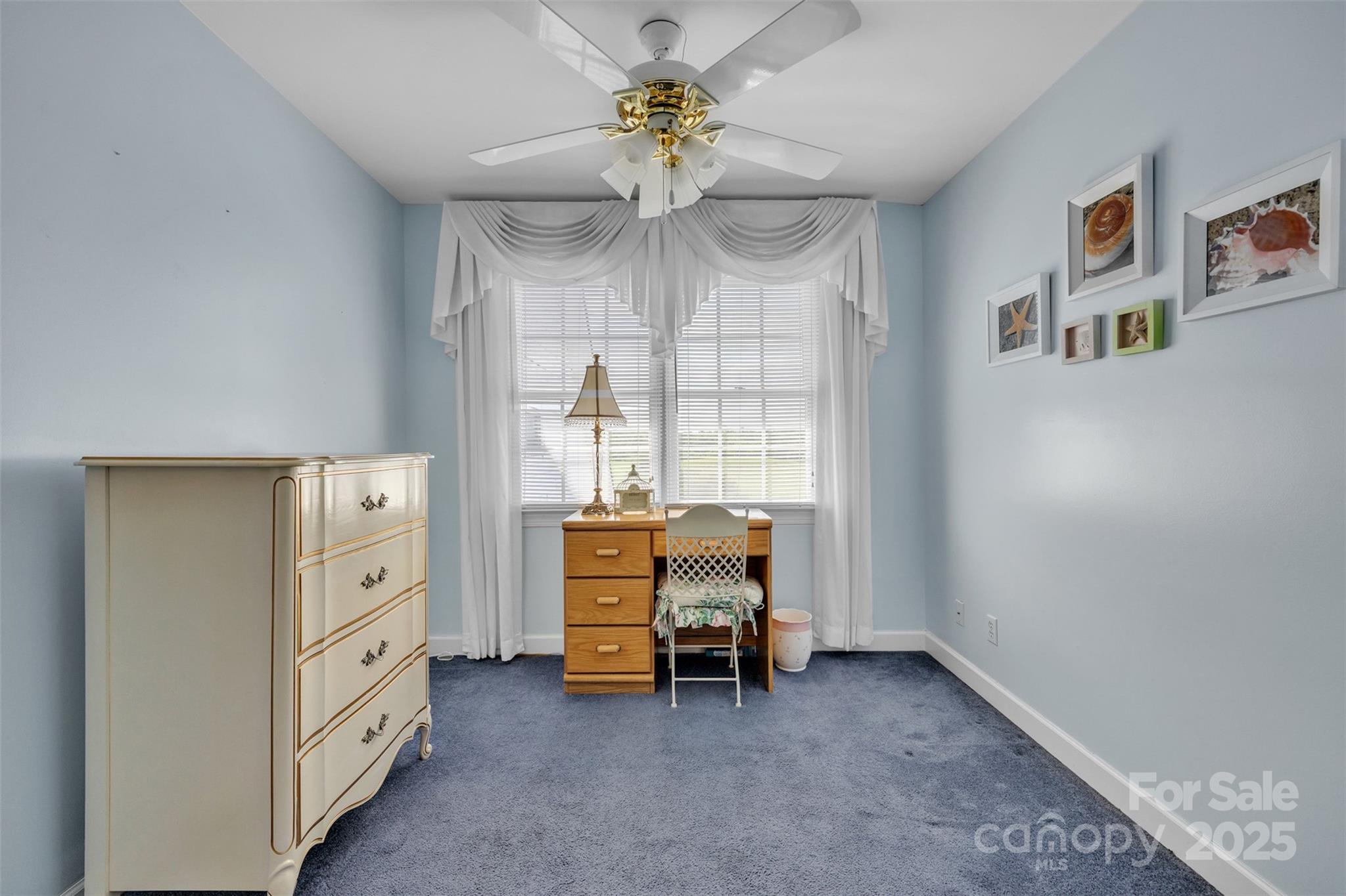 129 Renaissance Place Statesville, NC 28625 - Photo 29 of 43 a view of a bedroom with furniture and chandelier fan