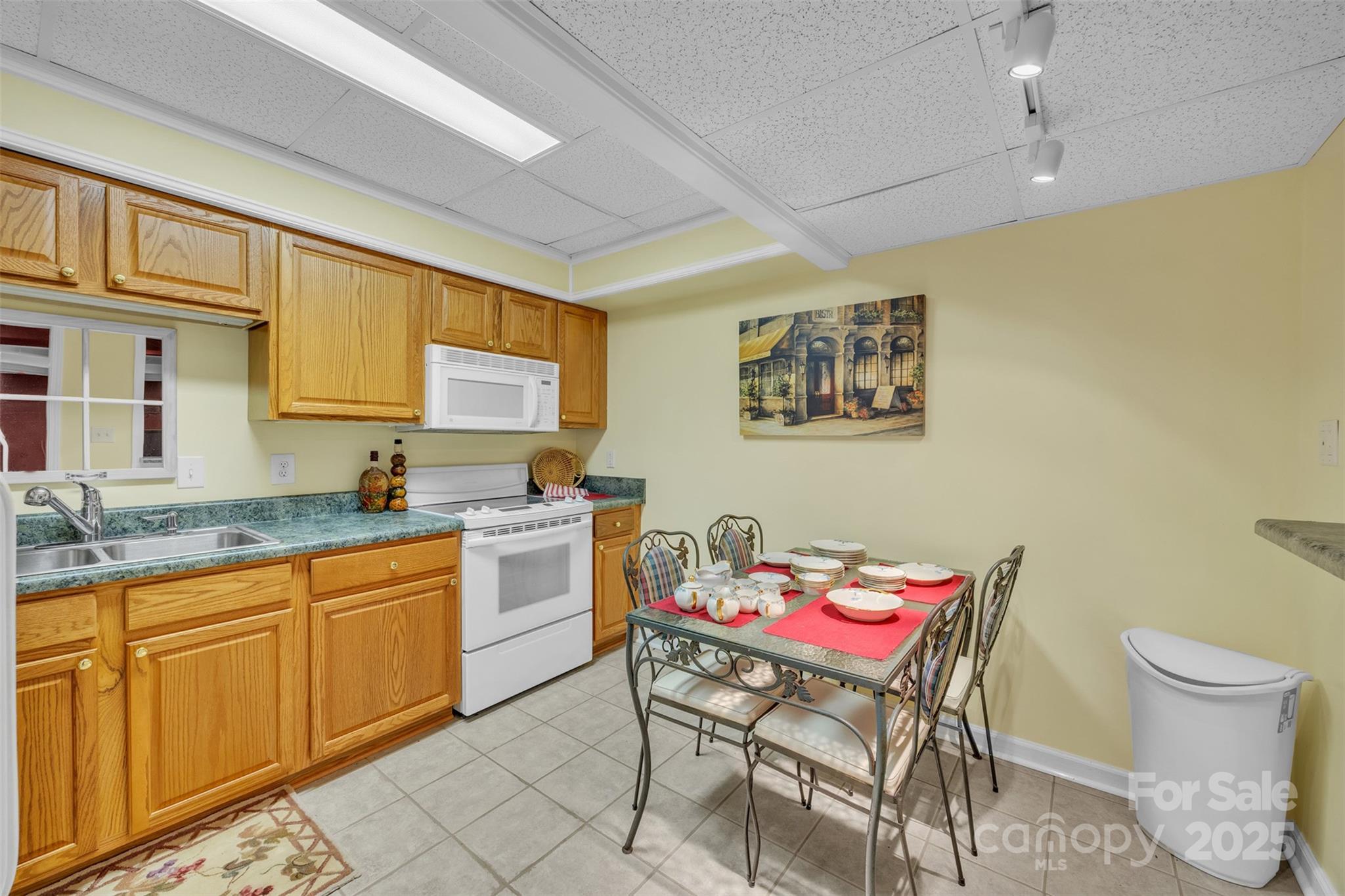 129 Renaissance Place Statesville, NC 28625 - Photo 35 of 43 a room with a chair and cabinets
