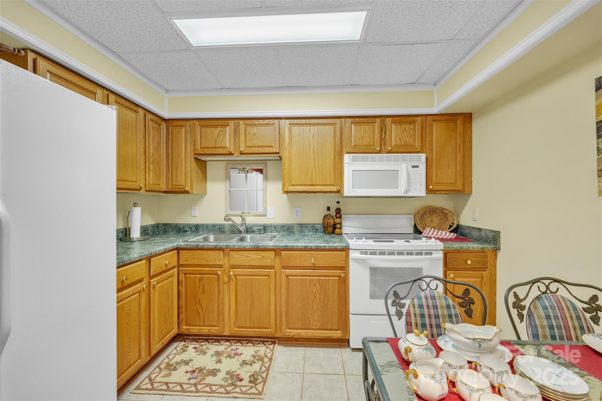 129 Renaissance Place Statesville, NC 28625 - Photo 36 of 43 a kitchen with stainless steel appliances granite countertop a sink stove and cabinets