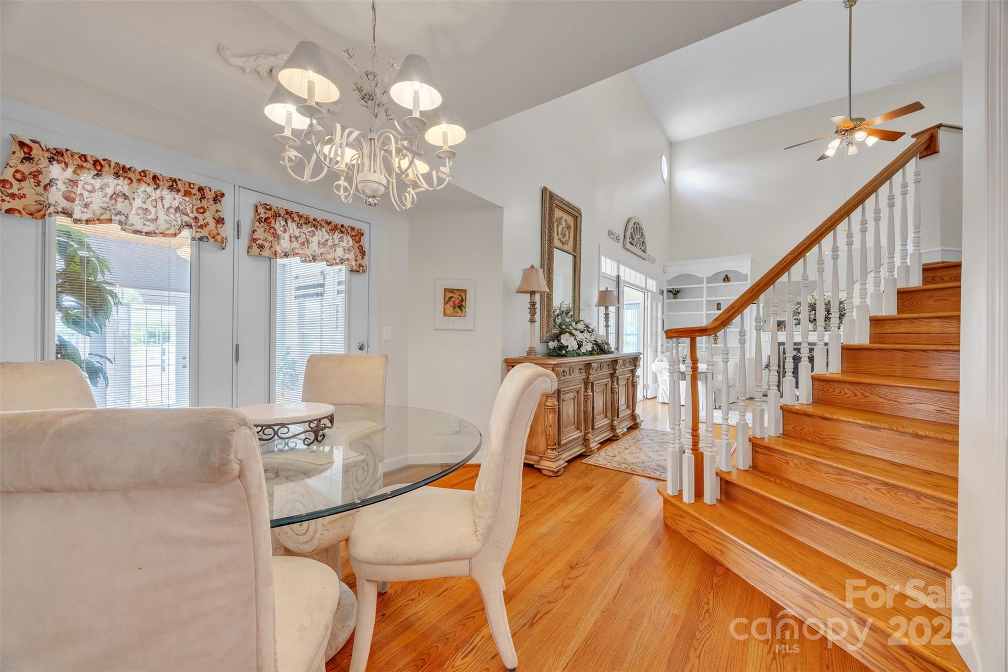 129 Renaissance Place Statesville, NC 28625 - Photo 9 of 43 a view of a dining room with furniture and a chandelier