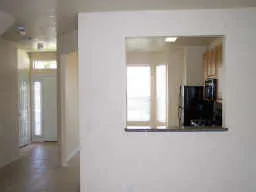 a view of a closet area with living room