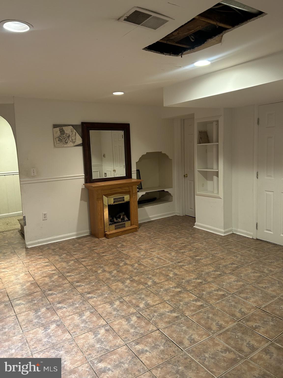 11309 Veirs Mill Road Silver Spring, MD 20902 - Photo 13 of 17 Basement rec room
