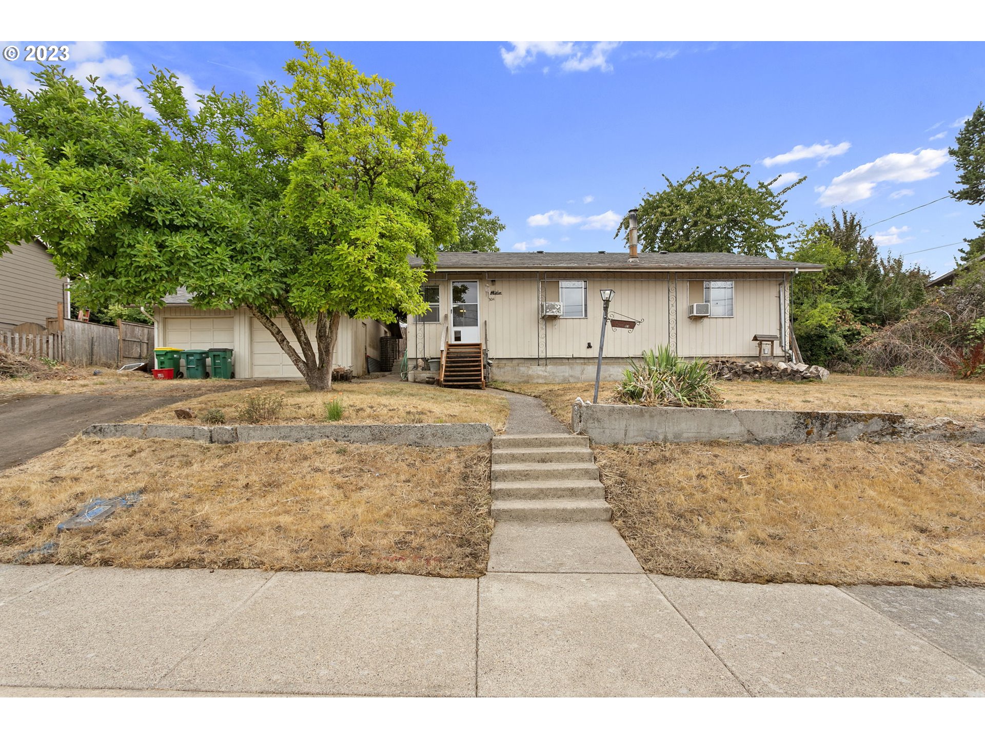 a house view with a outdoor space