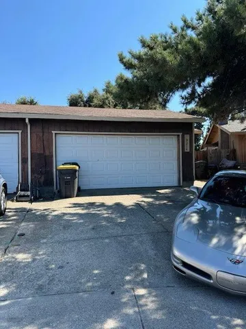 a view of a car parked in garage