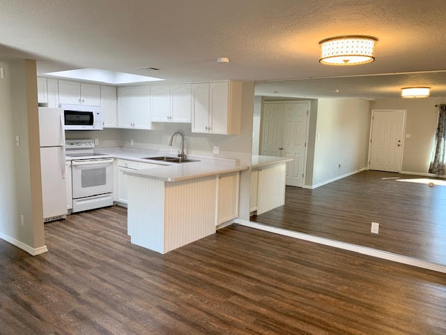 777 South 400 East, Unit 33 St. George, UT 84770 - Photo 1 of 1 White and open kitchen