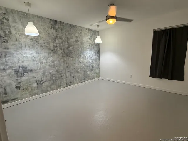 a view of a closet in a bathroom