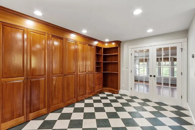 a view of a room with a black white checkered floor