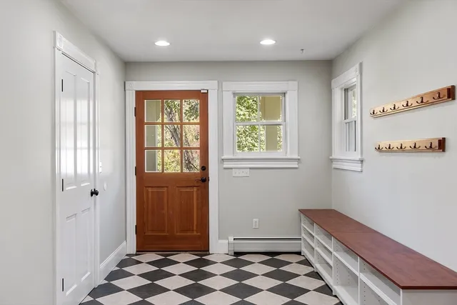 a room with window and furniture