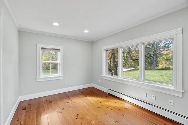 a view of a room with a large window