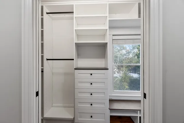 a view of an empty walk in closet