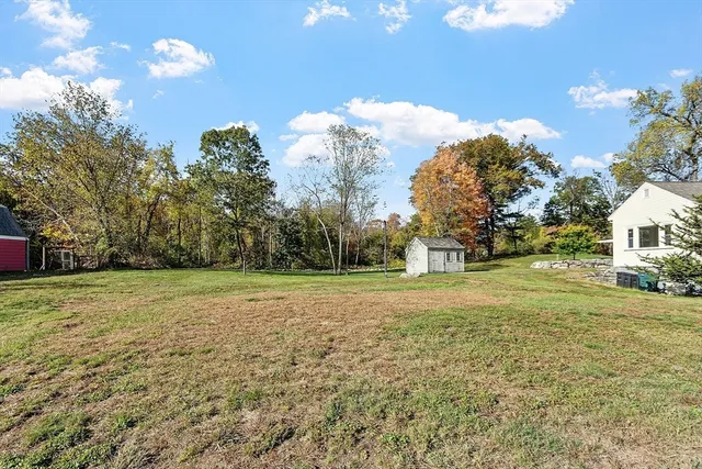 a bathroom with a sink and a yard