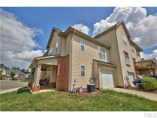 9827 Layla Avenue Raleigh, NC 27617 - Photo 20 of 20 a view of a house with a yard