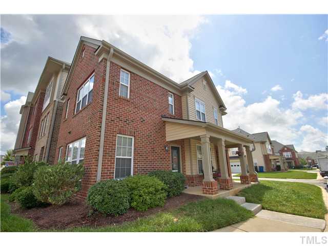 9827 Layla Avenue Raleigh, NC 27617 - Photo 2 of 20 a front view of a house with a yard