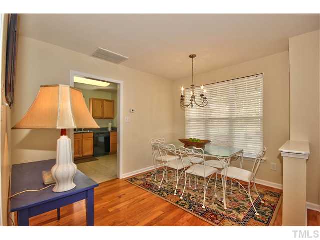 9827 Layla Avenue Raleigh, NC 27617 - Photo 9 of 20 a dining room view with table and chairs