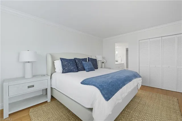 a bathroom with a sink double vanity granite tub and shower