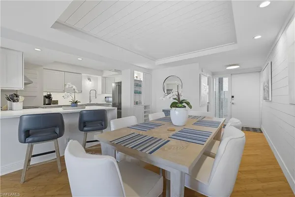 a view of a dining room with furniture