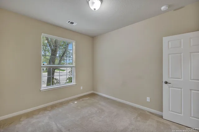 an empty room with a window