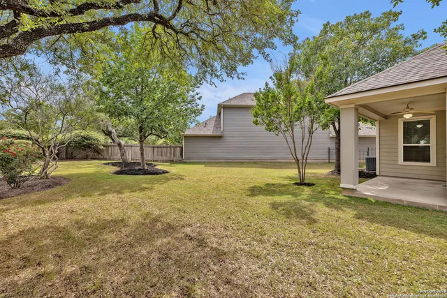 a view of a house with swimming pool