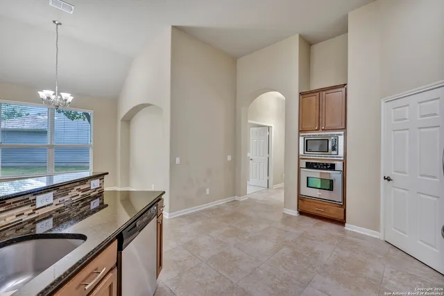 a view of a kitchen with a sink